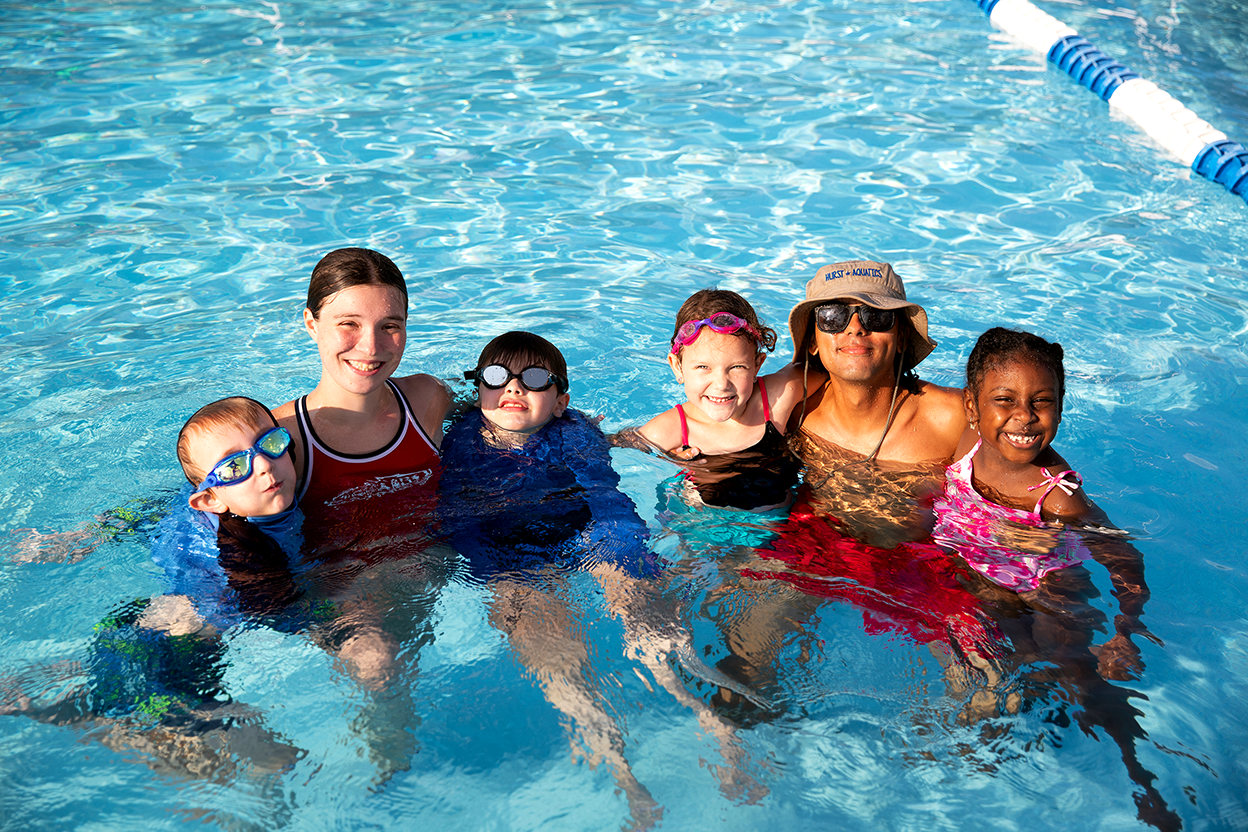 Swim Instructors and kids in pool