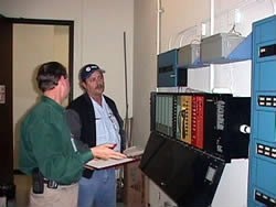 Building officials performing code inspection